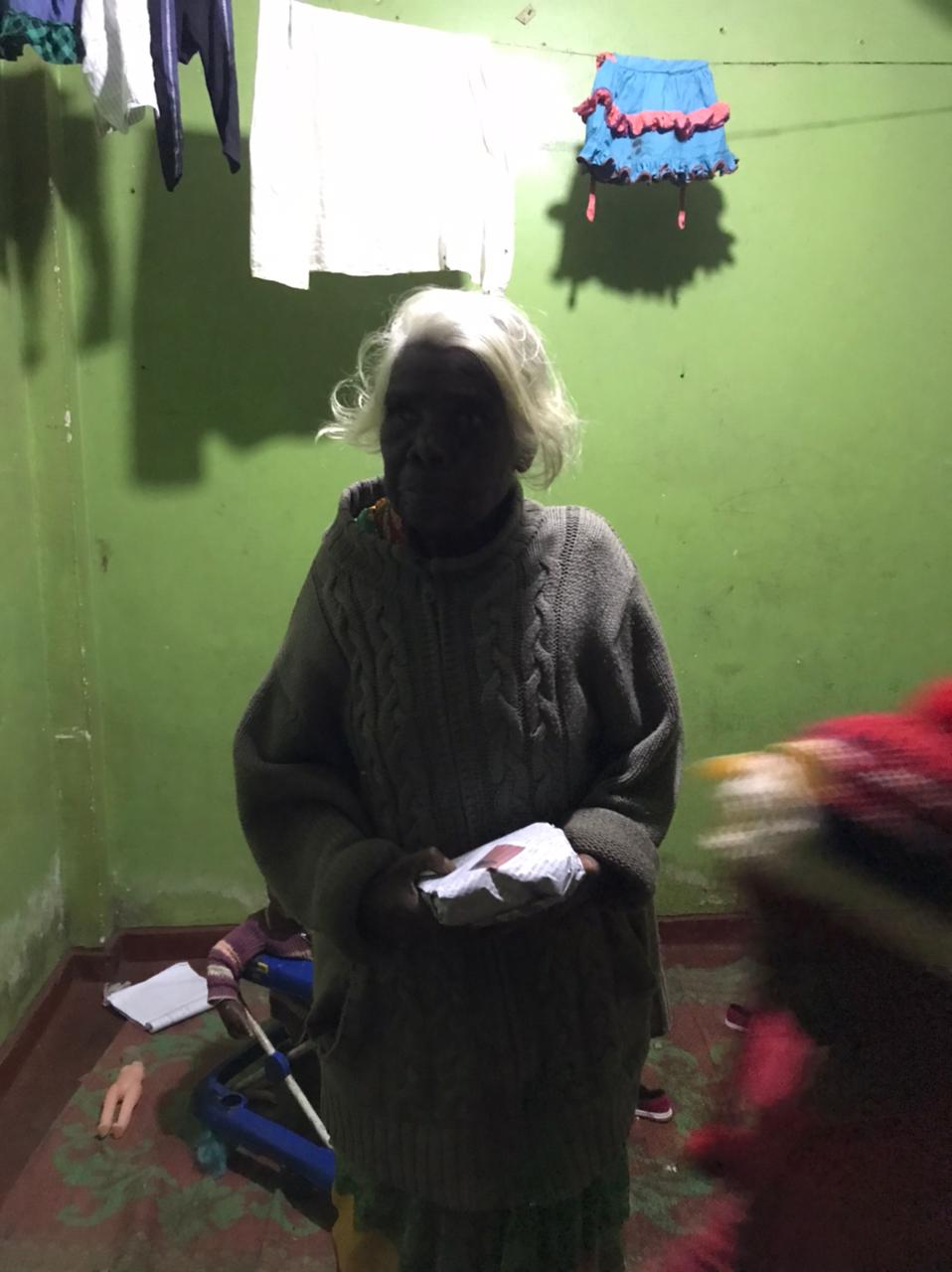 Elderly resident receiving emergency support